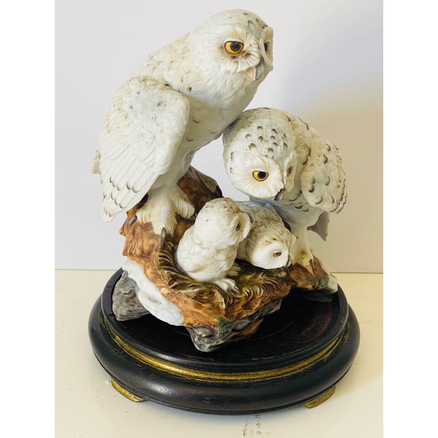 Famous sculpture of Sniwy owls family by Japanese artist Katsumo Ito. Bisque porcelain polychrome. On a hand carved wooden...