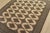 A tribal Bokhara Jaldar rug hand-knotted with fine wool on a cotton foundation. This rug features rows of repeating...