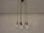Opal glass ceiling lamp with 5 balls and covers from rosewood from the 1960s. European Plug (up to 250V).The wiring of...