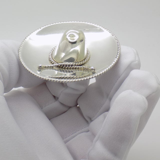 A vintage miniature depicting a traditional Mexican sombrero, handcrafted in Sterling Silver (925/000) in Mexico between...