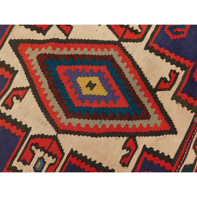 An attractive Vintage hand woven Persian kilim in geometric design. Navajo style. Flat weave. Wool texture on cotton...