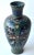 A lovely early (Meiji period) cloisonne vase, decorated with six panels of flowers and butterflies, with colors of black,...