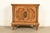 A gorgeous mid-century Hollywood Regency period bedside chest or nightstand In the manner of Karges Furniture Distributed...