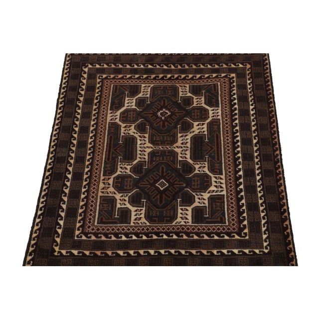 Hand knotted in wool, this 3x4 Baluch rug represents a new line of tribal carpets in the Modern Classics Collection by Rug...
