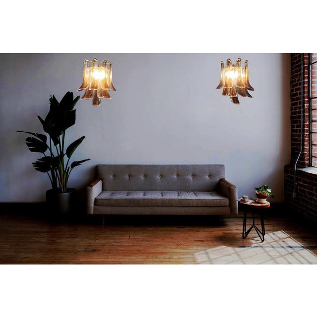 Pair of Vintage Italian Murano appliques in the manner of Mazzega. Wall lights have 10 glass petals (for each applique) in...