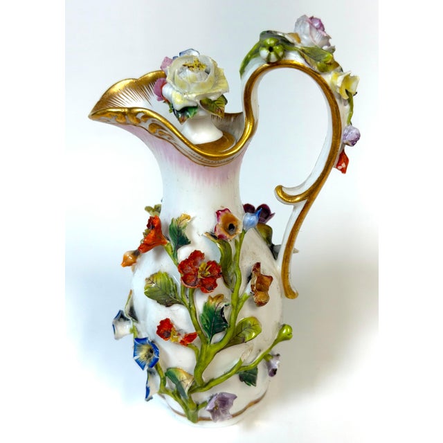 This Meissen Applied Floral Porcelain Perfume Ewer with Original Stopper exemplifies the extraordinary sculptural...