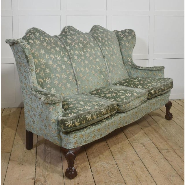 Bring refined character into your space with this beautifully upholstered three-seat sofa, distinguished by its graceful...