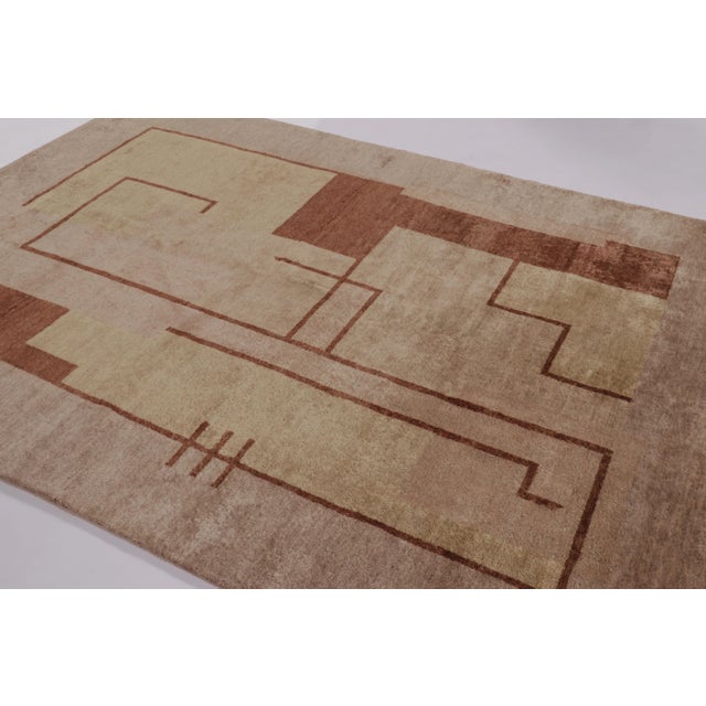 Hand-knotted in wool, this 6x9 rug by Rug & Kilim is a new addition to the French Art Deco rug collection—a contemporary...