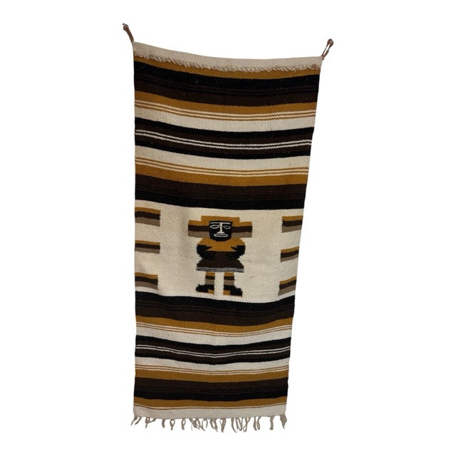 Crafted with care, this piece showcases rich earth tones (brown, cream, black) and a bold geometric pattern that adds...
