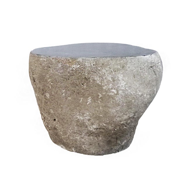A beautiful solid stone end table, from Indonesia. Contemporary. Rustic, unfinished sides with a smoothly polished grey...