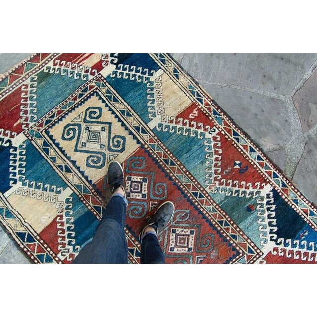 ✂ - - - - - m e a s u r e m e n t s: 4’11” x 7’4”, 150cm x 224cm, 14.30 Lbs C O L O R S Base: abrash blue Accents: dark...