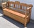 The wide top rail of this splendid storage bench is boldly scalloped and comes to a point in the center. With the narrow...
