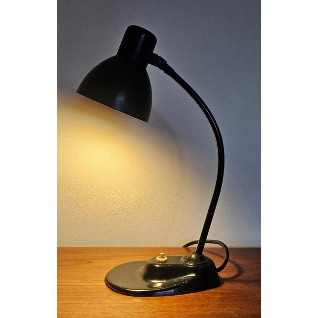 - marked - adjustable - bauhaus, art deco, functionalism - nice style of lighitng This piece is attributed to the...