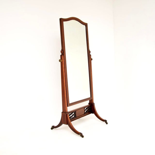 A large and very impressive antique Edwardian cheval mirror. This was made in England, it dates from around 1900-1910. It...