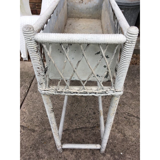 Wonderful chippy Victorian wicker plant stand. It has the original metal liner. It looks like it's had only one coat of...