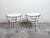 A pair of Italian steel side tables from the mid 20th century, with marble tops and shelves. Created in Italy during the...