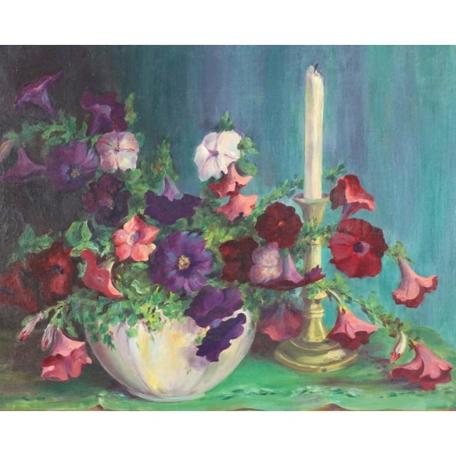 Wonderfully vibrant floral still life of petunias in bowl with brass candle stick by Jennie Thatcher Crawford (American,...