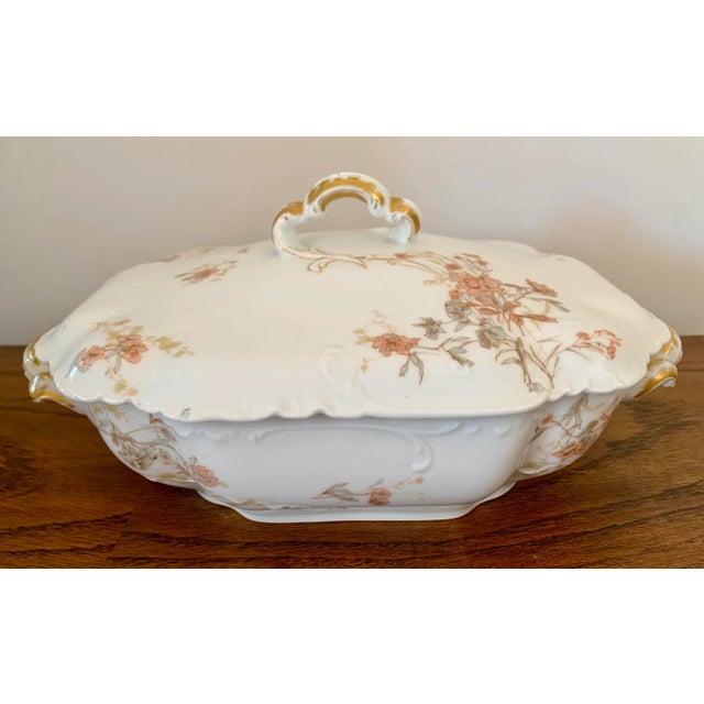Haviland & Co, Limoges, France started producing porcelain around 1860. The back marks on this large serving dish with lid...