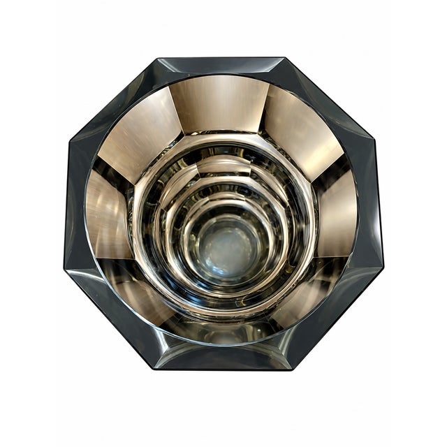 A beautifully simple statement piece of high-modernist design, this authentic 1930s Art Deco faceted smoky crystal vase is...