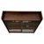 A substantial and highly practical 20th-century oak display cabinet, offering generous display capacity within an...