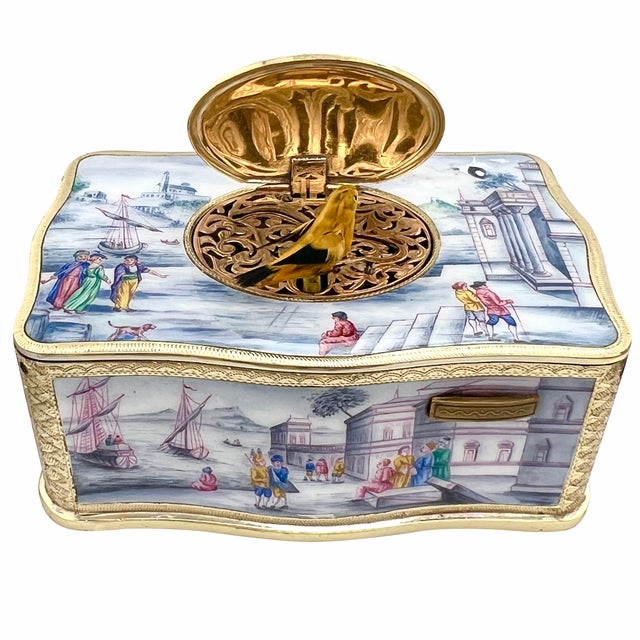 Discover the exquisite craftsmanship of the Karl Griesbaum Enamel Singing Bird Box Automaton. This fine bird box...