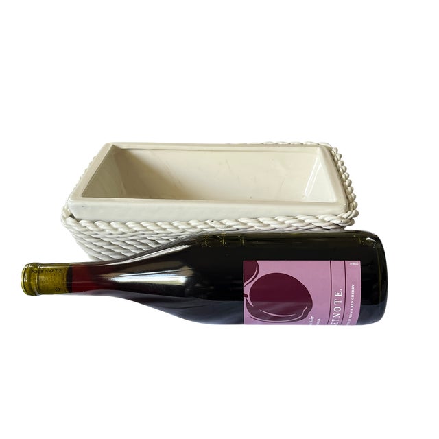 A beautifully sculptural 1950s Italian ceramic jardinier featuring an elegant trellis (treillage) design wrapped in a...