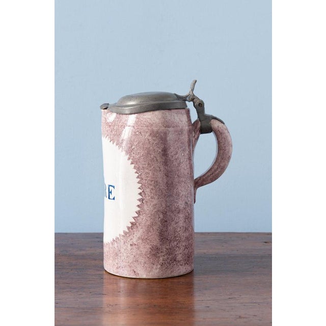 Height: 22 cm Diameter: 14 cm Slight glaze losses to spout and under the handle, otherwise very good condition.