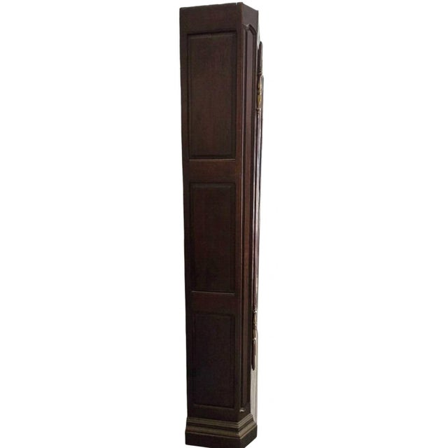 French Provincial Regence Style Armoire or Bibliothèque (wire-front cabinet). It features a traditional "gendarme's hat"...