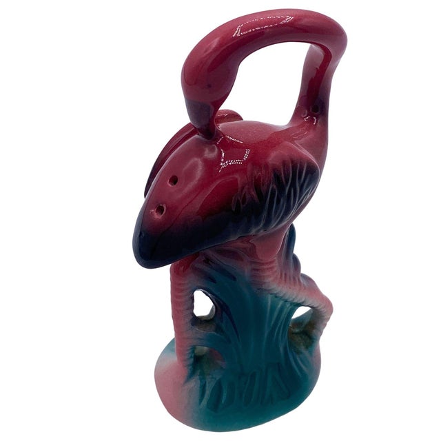Mid-century pink and green ceramic flamingo tabletop salt & pepper shaker set by Five & Dime. The set features two...
