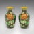 This is a pair of small vintage cloisonné posy vases. A Japanese, ceramic flower urn, dating to the late Art Deco period,...