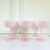 Set of six lovely soft cotton candy pink color coupe cocktail glasses with ripple optic swirl design and white rim. Brand...