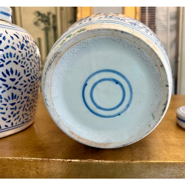 This is a set of three Chinese blue and white double happiness ginger jars. The jars are in very good condition and have...