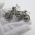 Vintage solid silver figurine depicting a motorcycle, handcrafted from individually assembled silver parts in Arezzo,...