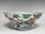 A stunning Chinese polychrome enamel (Famille Rose / Fencai) porcelain bowl featuring a scalloped foliate rim and rich,...