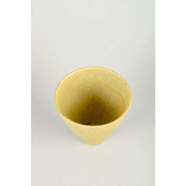 Scandinavian studio potter, likely Gustavsberg. Miniature vase, 1960s. Small conical studio piece in thrown stoneware with...