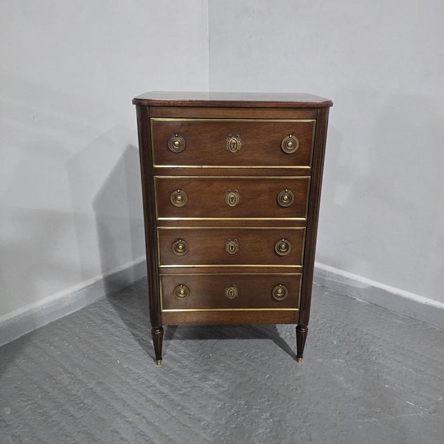 Super Empire mahogany chest of four drawers of small proportions, gilt brass handles, escutions ad toes, baize lined...