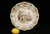 From the potteries of Lille France in the late 19th century, a transferware and hand-painted faience earthenware plate...