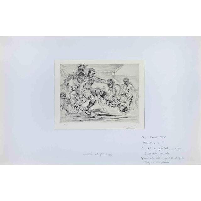 Le Match de Football is an original etching realized by Louis Marcel Myr (1893-1964) in 1925. The original work is...