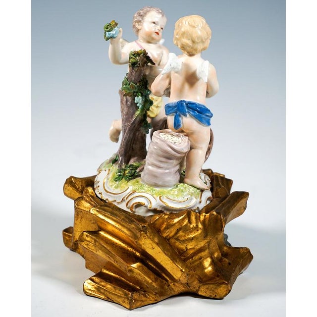 Excellent piece of meissen porcelain of the 18th century: two scantily clad, winged cherubs engaged in field work and...