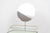 Dressing table by Auping. This piece consists of a round mirror on a metal frame. The table comes with a wooden cabinet...