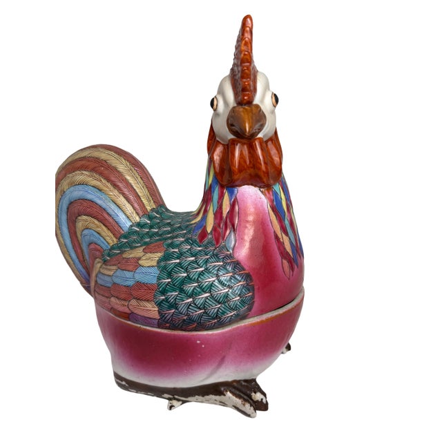 A striking 1930s Chinese Export polychrome porcelain rooster tureen, richly hand‑painted in a multi‑color palette of muted...