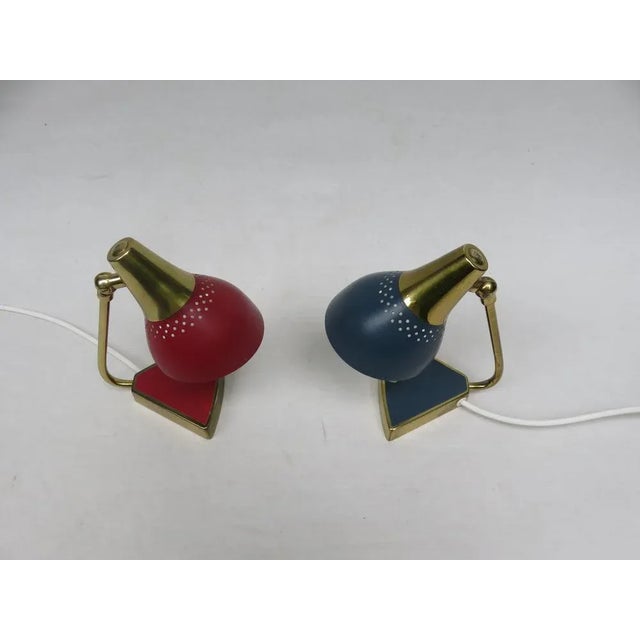 A few bedside lights, small table lamps from the 50s The two lights are different in color, once red and once blue in...