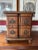 Petite arts and crafts style 4 drawer oak cabinet or drinks table with button feet. Originally sold as a cabinet for...