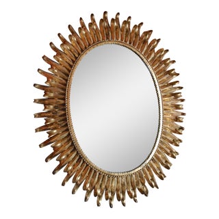 Hollywood Regency Oval Sunburst Gilt Metal Mirror For Sale