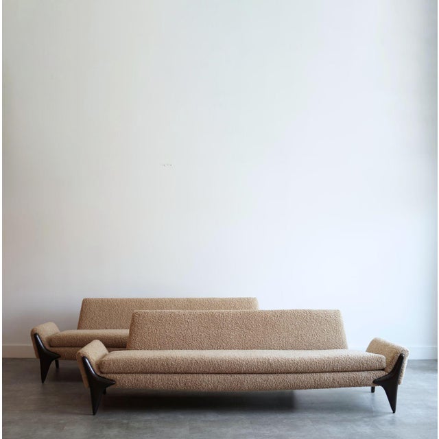 Set of iconic gondola sofas by Adrian Pearsall, circa 1950s, masterfully restored by Stamford Modern. These sculptural...