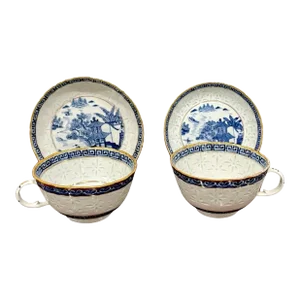 19th Century Blue & White Nanking 'Rice Grain' Cups & Saucers, Qianlong Marked - a Pair