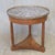 A classic antique 1930s French empire cherry wood guéridon table with inset black marble top surrounded by a pierced brass...