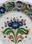 Spanish faience majolica charger, hand painted with exuberant polychrome floral decoration in cobalt blue, green, rose,...