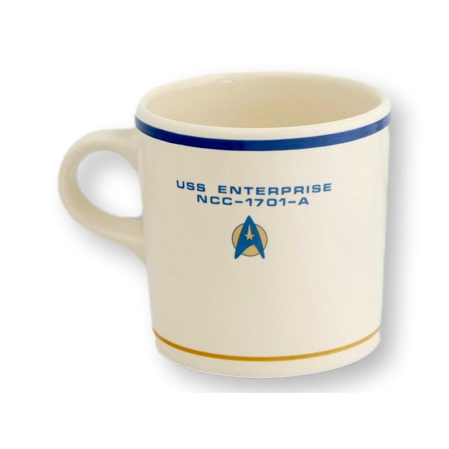 1994 Pfaltzgraff Star Trek VI: The Undiscovered Country place setting featuring the USS Enterprise insignia. This three...