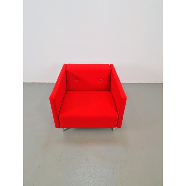 Used Bottoni armchair designed by Marcel Wanders for Moooi, in good condition. The Bottoni armchair is upholstered in red...